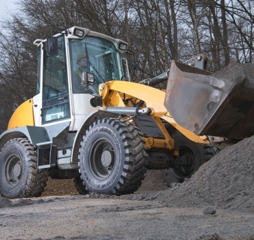 GOODYEAR POWERLOAD® - DURABILITATE ȘI TRACŢIUNE ÎMBUNĂTĂŢITĂ PENTRU ÎNCĂRCĂTOARE PE ROŢI ȘI GREDERE
