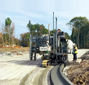 WIRTGEN AUTOPILOT 2.0 MAI MULTĂ PRECIZIE, VITEZĂ DE LUCRU MAI MARE ȘI COSTURI MAI MICI LA INSTALAREA PROFILELOR RUTIERE MONOLIT DE BETON